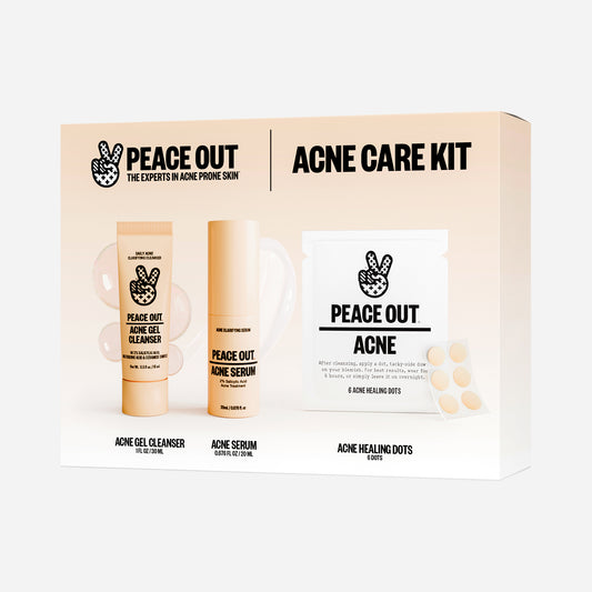 Peace Out Acne Care Kit featuring an Acne Gel Cleasner, Acne Serum, and an Acne Treatment Dots packet on a white background within a soft peach box.
