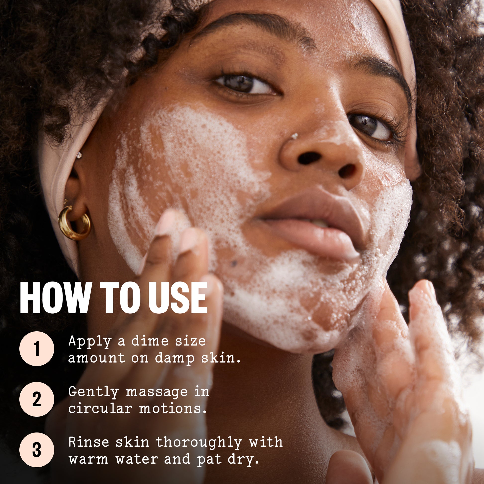 Close-up of a woman applying and massaging a white foaming facial cleanser on her face, with overlaid text reading 'HOW TO USE' and three numbered steps.