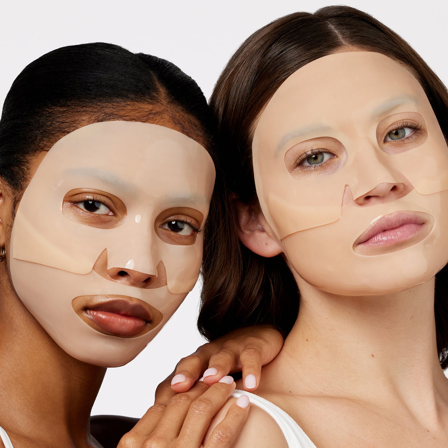 Two women wear Peace Out Barrier Revitalizing & Renewing Overnight Recovery Mask