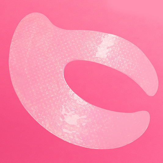 Retinol Eye Lift Patch hover on a pink background