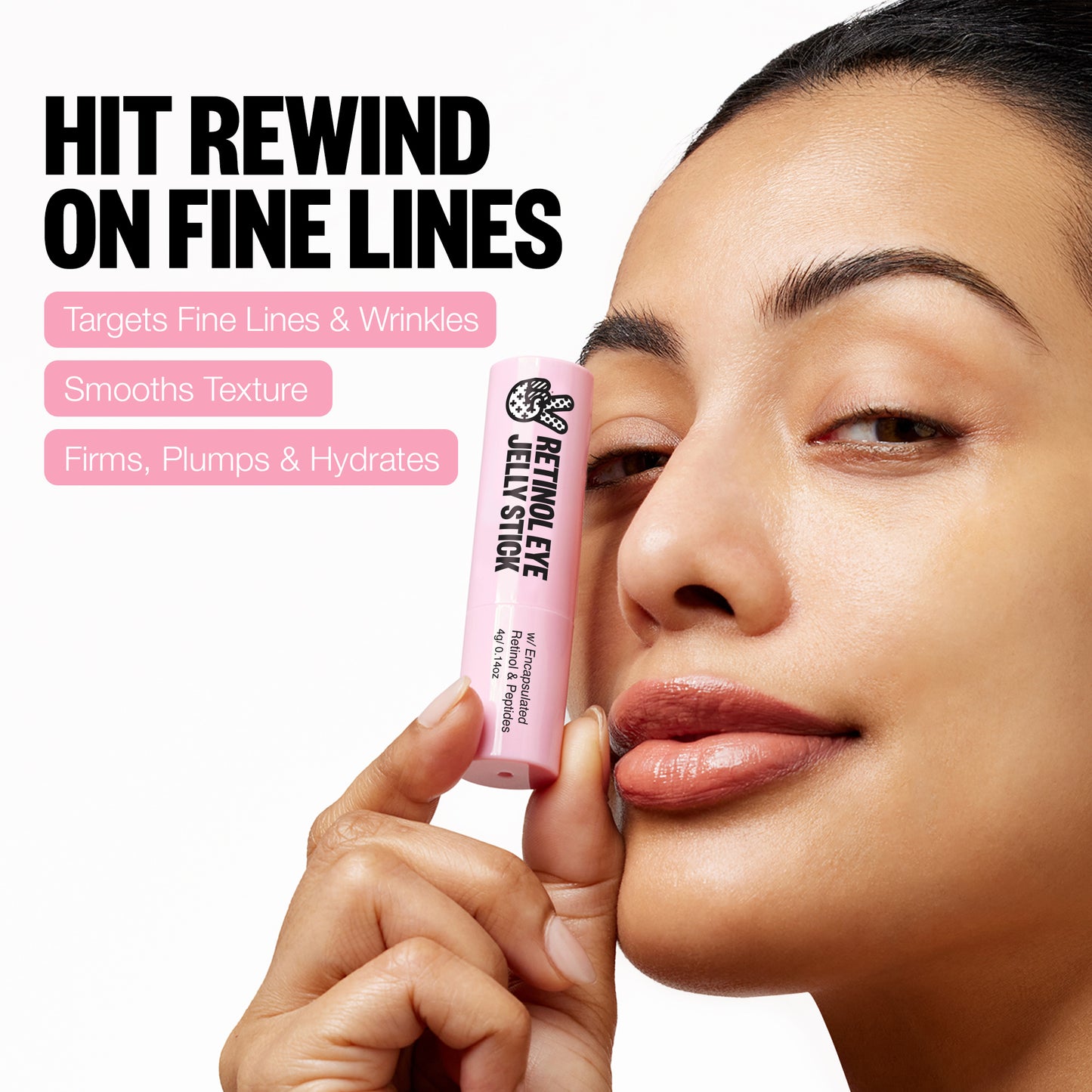 A woman holds up the Retinol Eye Jelly Stick next to the caption 'Hit rewind on fine lines!'