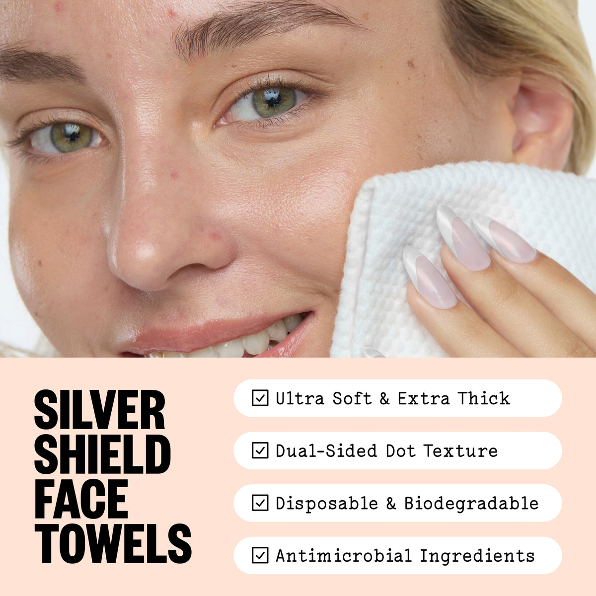 Close-up of a woman wiping her face with a Peace Out Silver Shield Face Towel and feature callouts including ultra soft & extra thick, dual-sided dot texture, disposable & biodegradable, and antimicrobial ingredients.