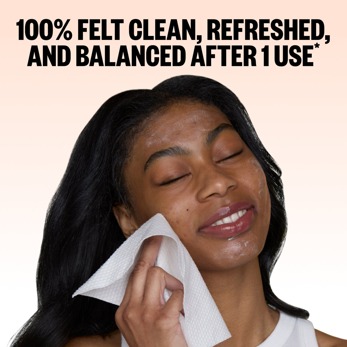 A woman with closed eyes holding a Peace Out Silver Shield Face Towel near her face, with large text at the top reading '100% FELT CLEAN, REFRESHED, AND BALANCED AFTER 1 USE'.