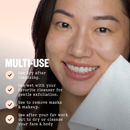Close-up of a smiling woman holding a Silver Shield Face Towel to her face, with text reading 'MULTI-USE' and bullet points about using a cleanser, masks, makeup, and exfoliating. No product container is visible.